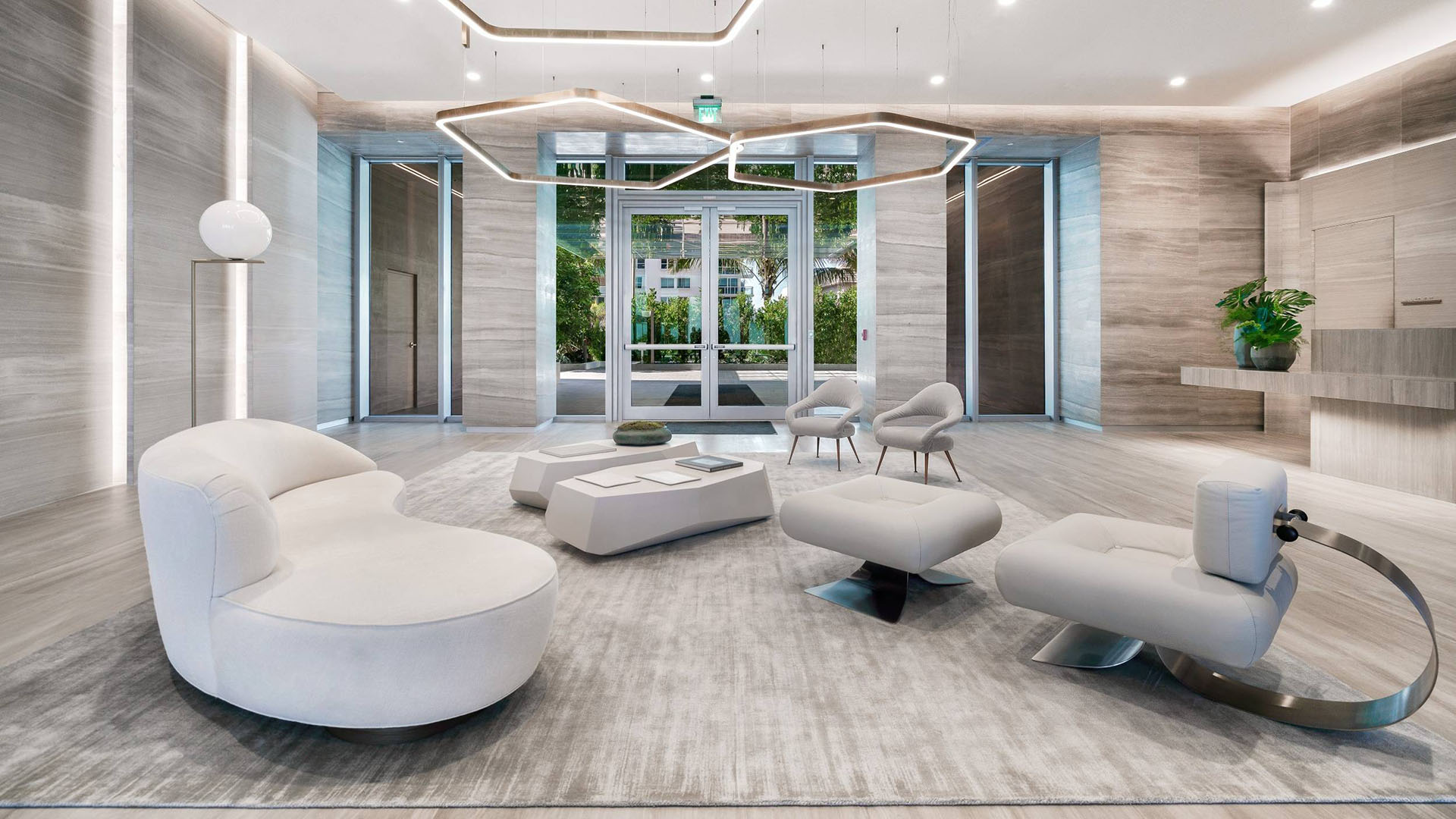 57 Ocean Miami Beach modern lobby interior design with upscale materials, showcasing luxury and ultra luxury preconstruction condos arrival experience in Mid-Beach, Miami Beach, Florida.