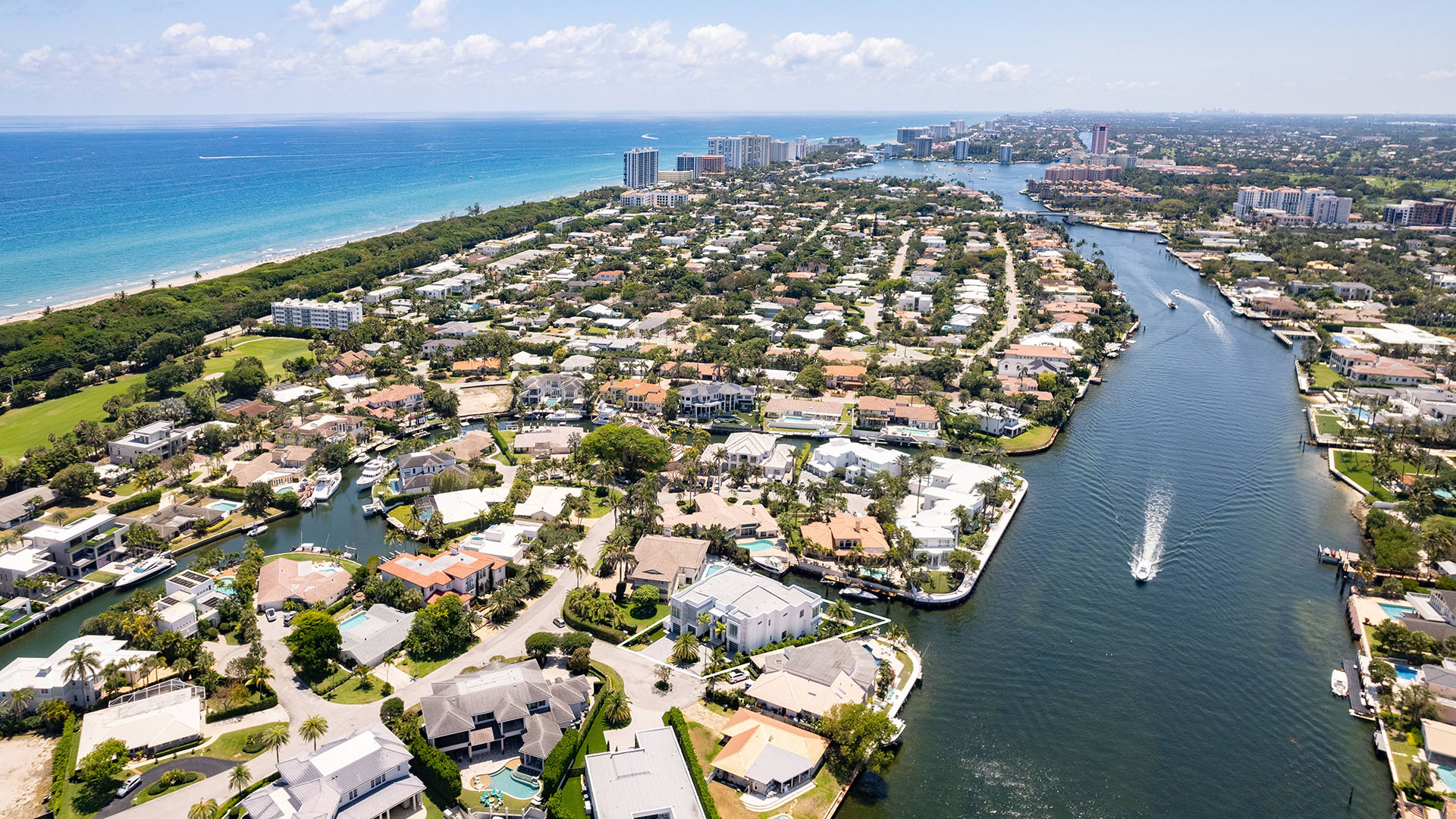 749 Bamboo Dr Boca Raton coastal aerial view of Sun and Surf waterfront homes in South Florida, showcasing luxury and ultra luxury resale lifestyle with estate residences and nearby condos, Boca Raton, Florida.