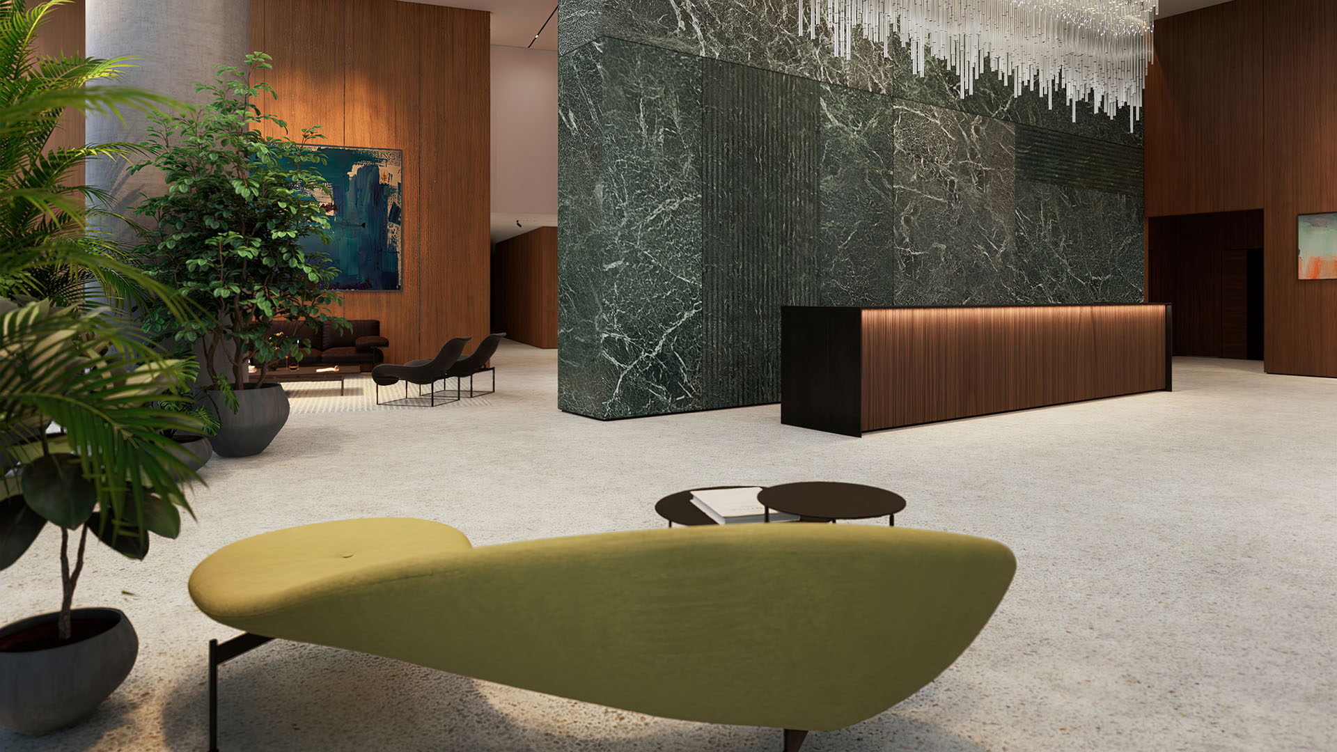 Casa Bella by B&B Italia Downtown Miami grand lobby with marble feature wall, concierge desk, statement chandelier and lush greenery, showcasing luxury and ultra luxury preconstruction condos arrival experience.