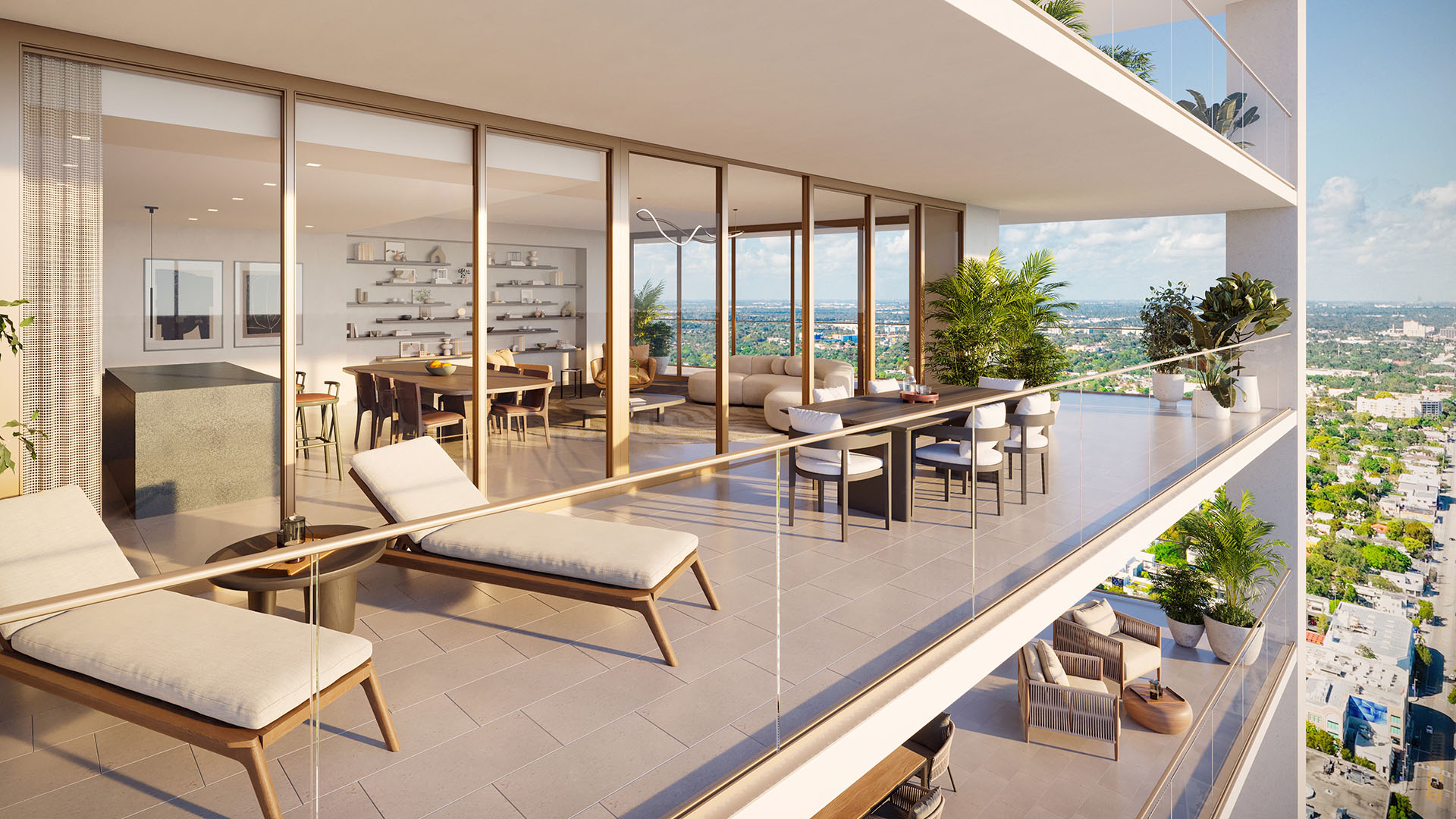 Wraparound balcony at Jean-Georges Miami Tropic Residences in Miami, Florida, with outdoor dining, lounge chairs and expansive city views, highlighting luxury and ultra luxury preconstruction condos with indoor-outdoor living.
