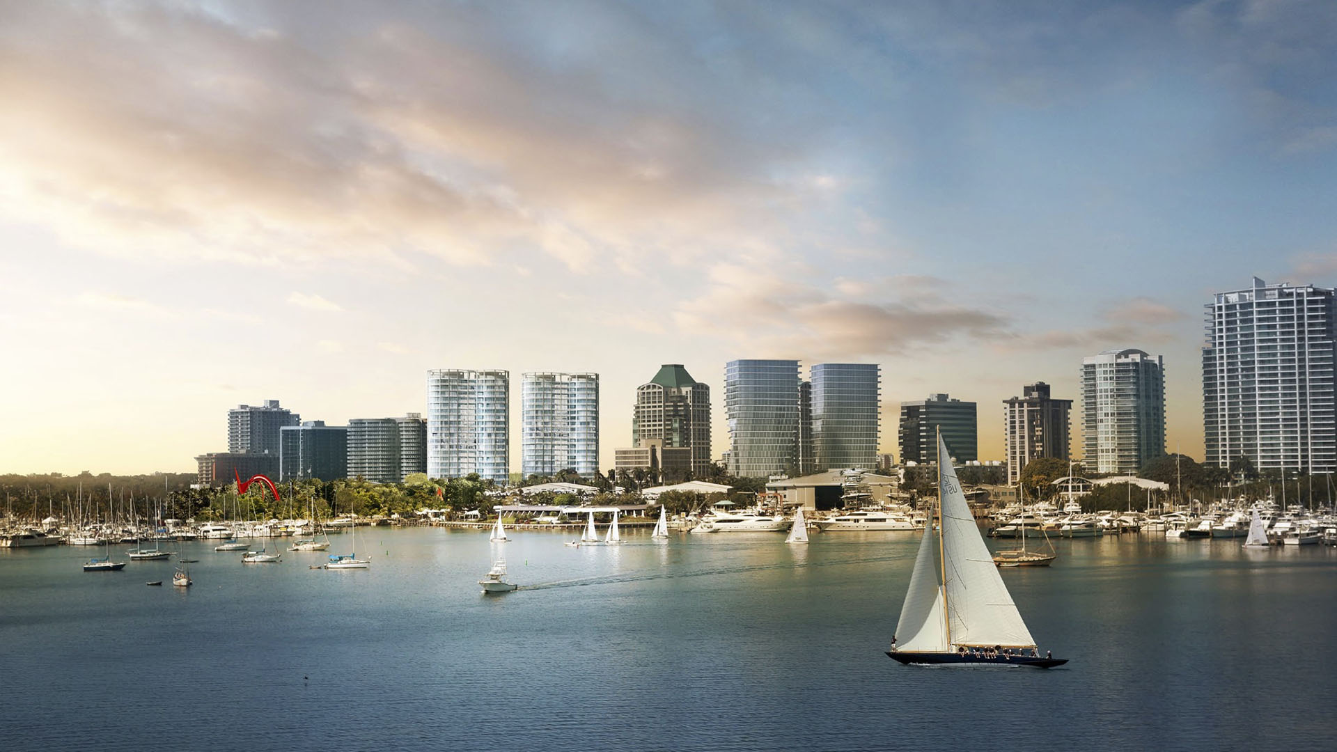 Waterfront skyline view with marinas, sailboats and a prominent sailboat in the foreground near Park Grove in Coconut Grove, framing the luxury and ultra luxury condos setting.