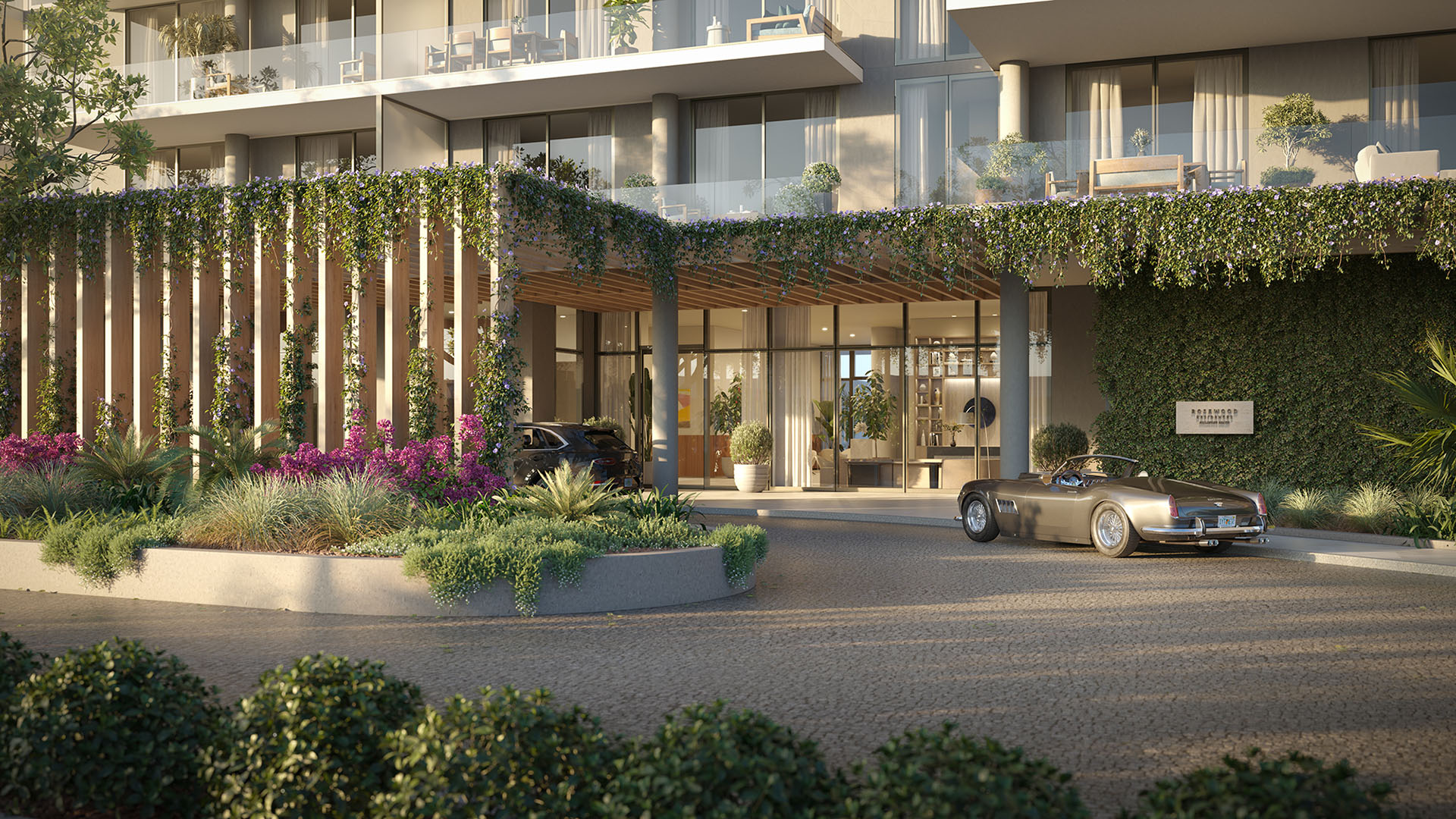 Arrival porte cochere at Rosewood Residences Hillsboro Beach on Hillsboro Mile, Florida, with lush landscaped entry and lobby drop-off, showcasing luxury and ultra luxury preconstruction condos.