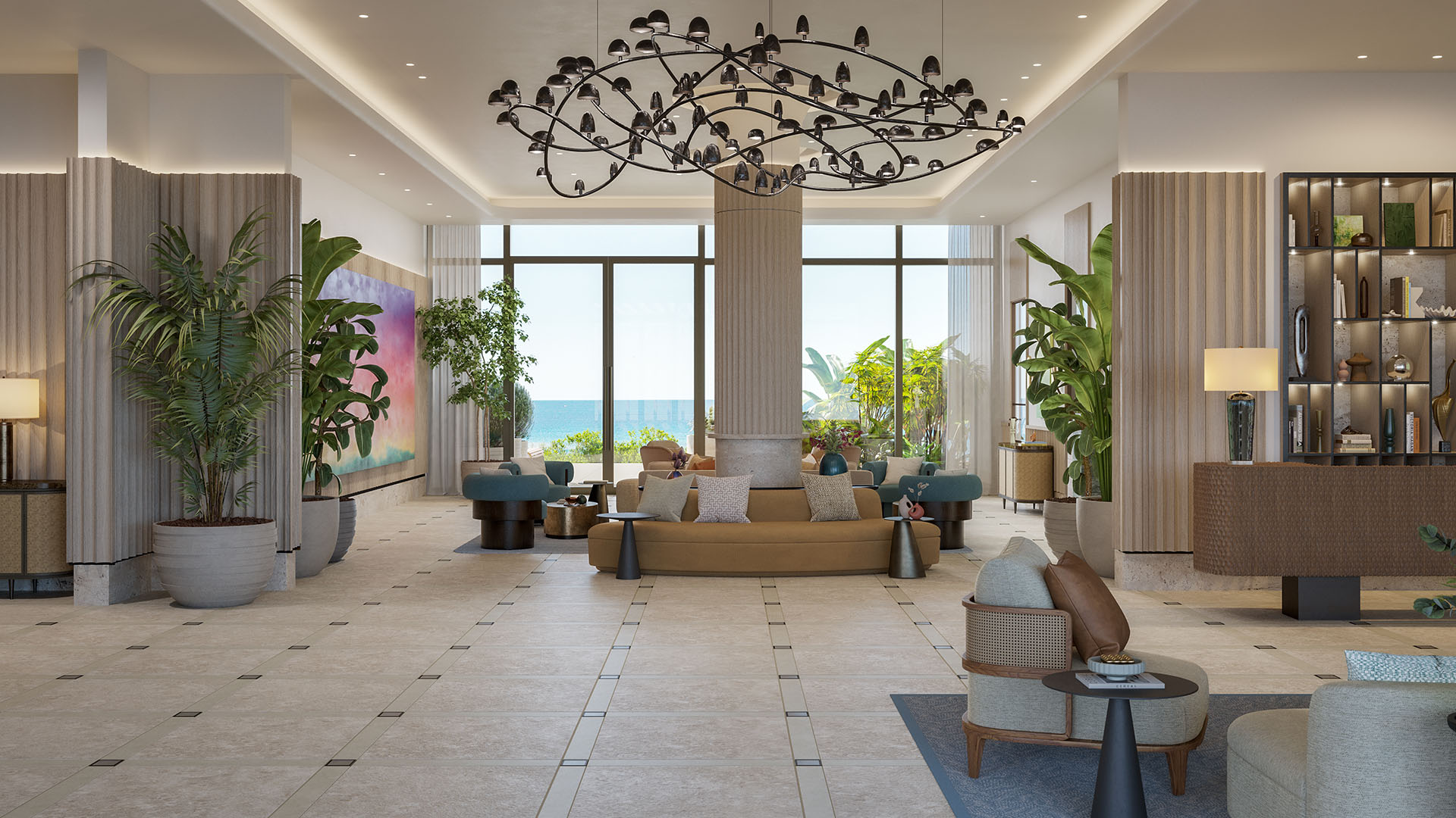 Lobby lounge at Rosewood Residences Hillsboro Beach, Florida with sculptural chandelier, designer seating and Atlantic Ocean view, defining luxury and ultra luxury preconstruction condos lifestyle.