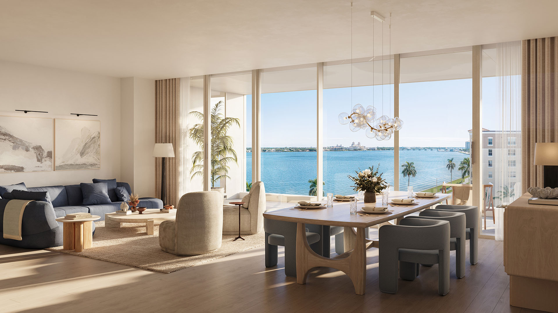 Shorecrest Flagler Drive open-concept living room and dining in West Palm Beach, Florida, with floor-to-ceiling windows and waterfront views - luxury and ultra luxury preconstruction condos residence interior.