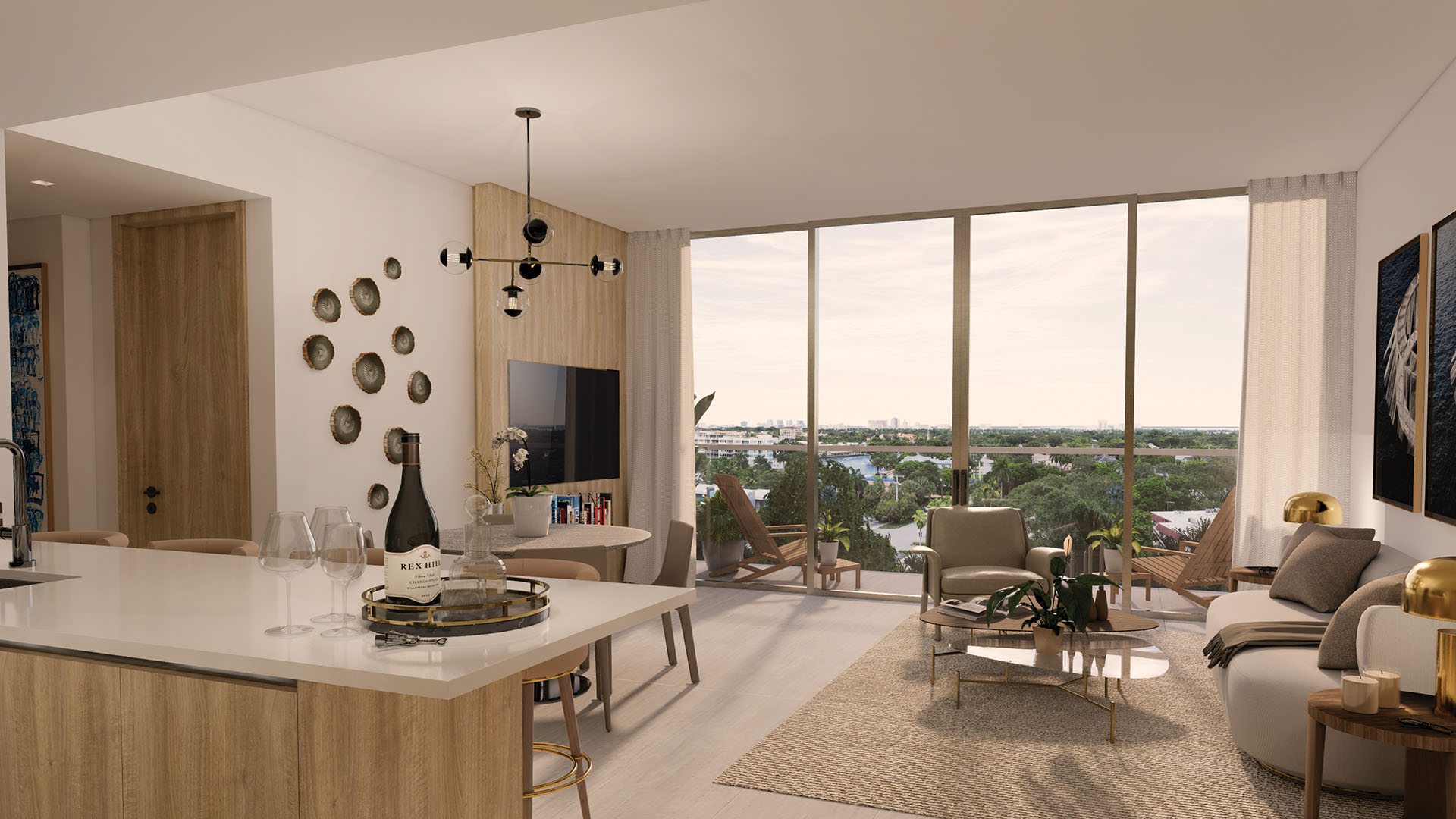 Sixth & Rio luxury and ultra luxury preconstruction condos in Fort Lauderdale, Florida, open living room and kitchen with island and floor-to-ceiling sliding glass doors to balcony with city and water views.