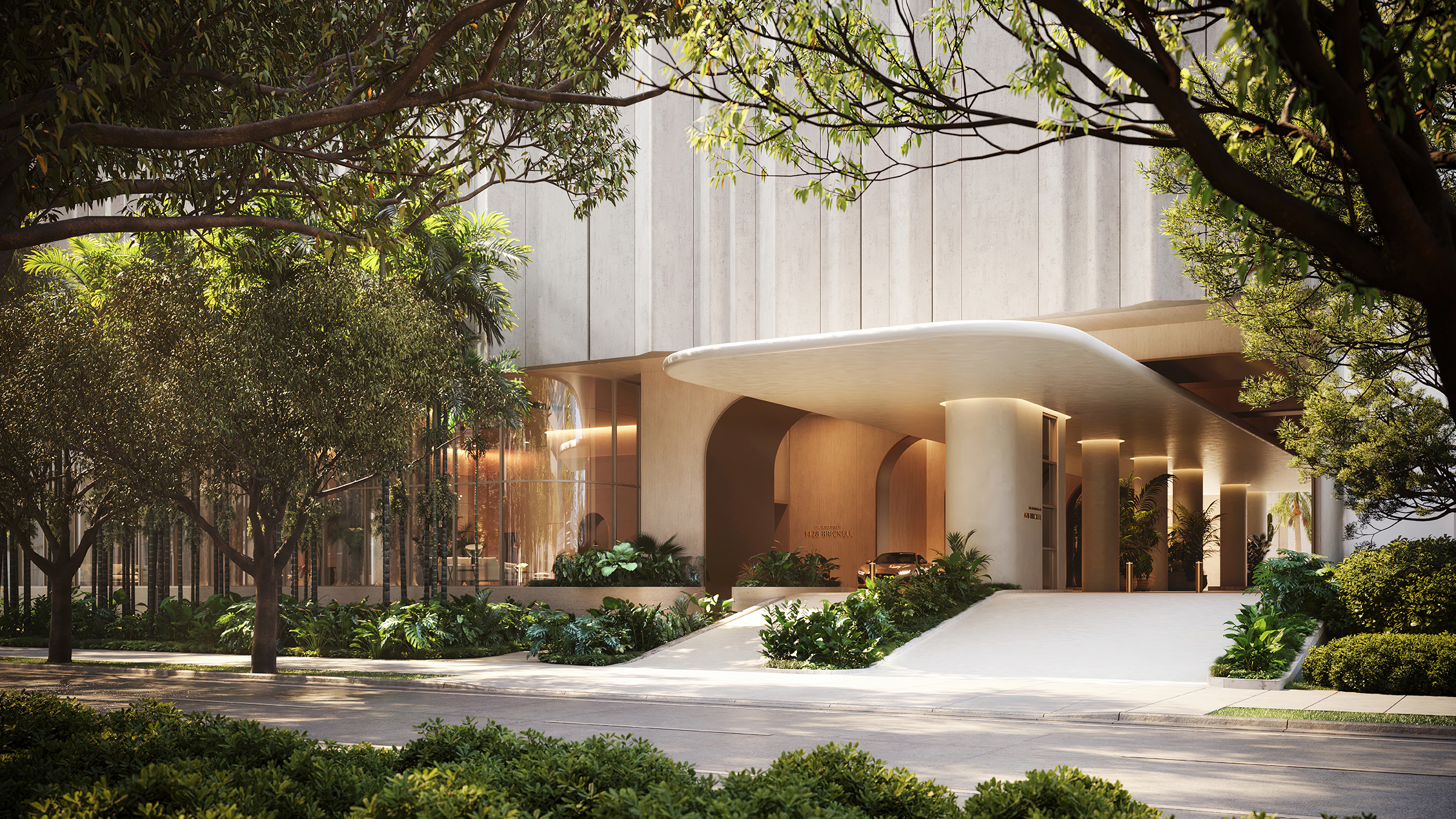 The Residences at 1428 Brickell landscaped entrance with greenery. Brickell, Miami; refined arrival for luxury and ultra luxury condos, preconstruction. Featuring modern and architectural.