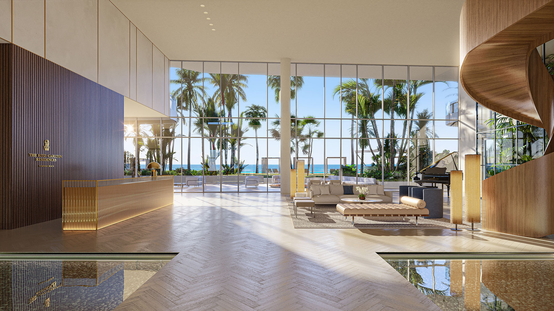 Double-height lobby with reception desk and floor-to-ceiling ocean views at The Ritz-Carlton Residences Pompano Beach, Florida Beach Tower, setting the tone for luxury and ultra luxury preconstruction condos with Ritz-Carlton service.