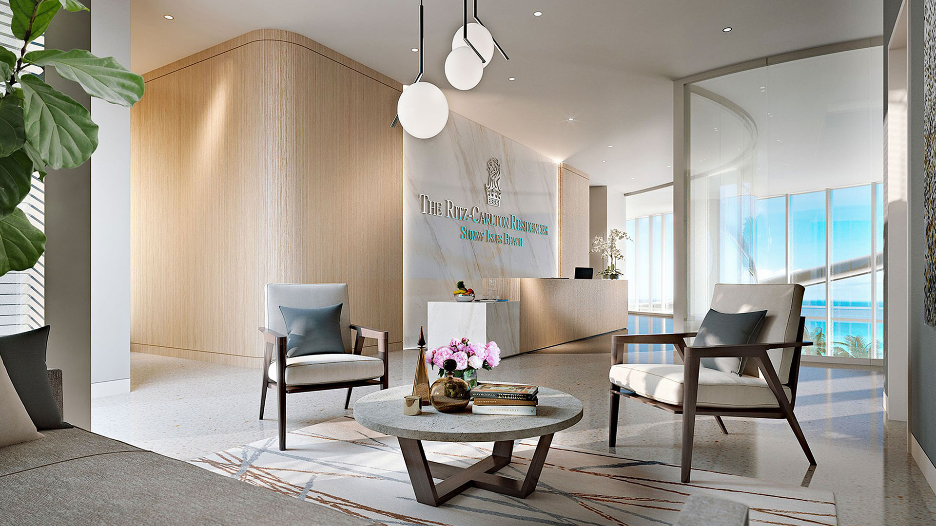 Arrival lobby with reception desk, seating area, and ocean light at The Ritz-Carlton Residences, Sunny Isles Beach, luxury and ultra luxury condos in Sunny Isles Beach.