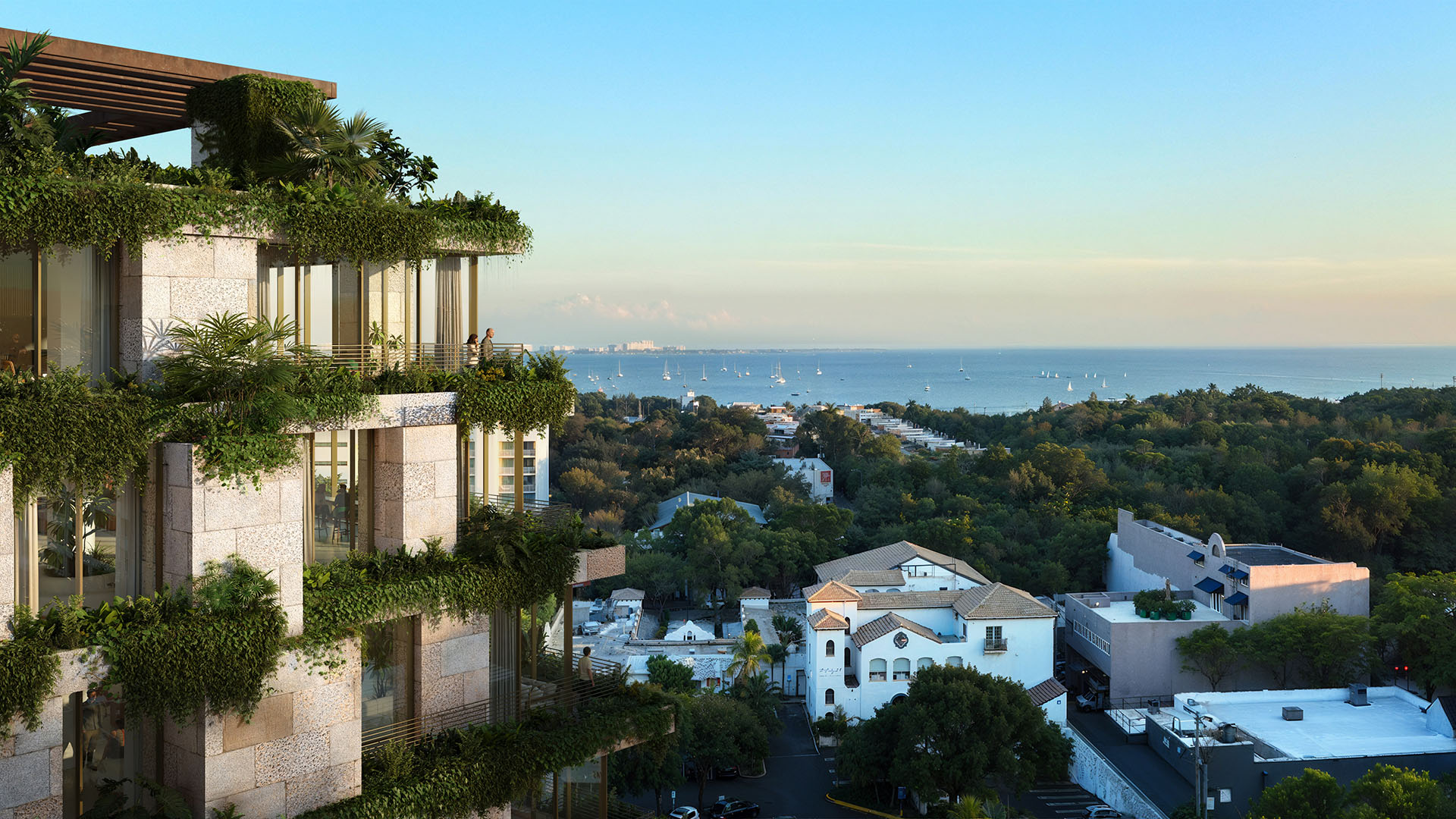 Green-terrace facade of Ziggurat Coconut Grove, Miami, Florida, overlooking Biscayne Bay and sailboats, highlighting luxury outdoor living and ultra luxury preconstruction condos with panoramic water views.